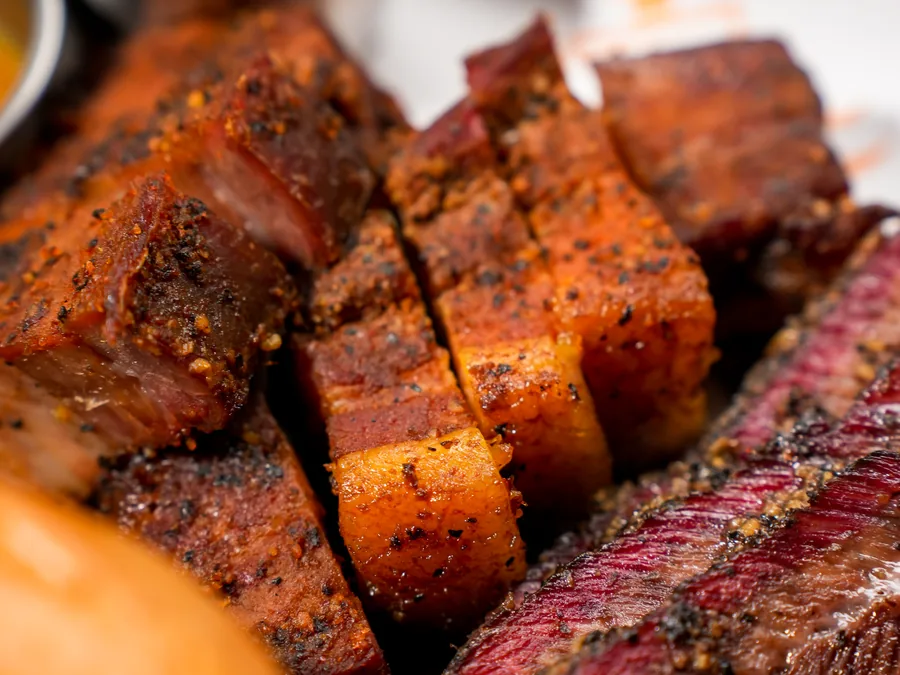 Honey-glazed Iberico burnt ends, cubed with a dark caramelised crust
